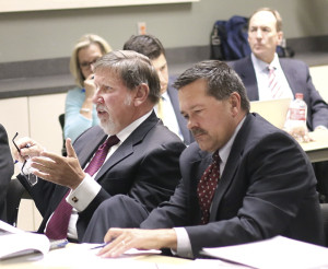 Southwest Virginia Health Authority staffer Dennis Barry questions FTC representatives as SVHA chairman Terry Kilgore listens.